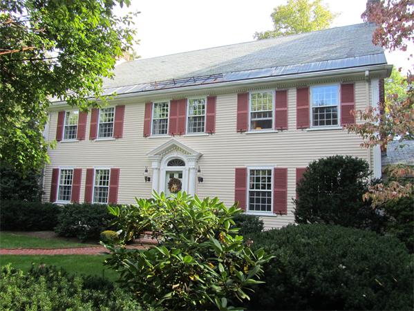 2 Woodchester Road Wellesley, MA 02481 - Photo 1 of 1 a front view of a house with plants and trees