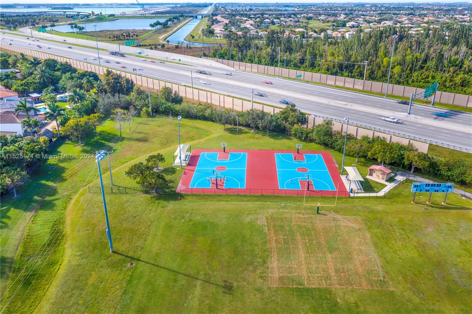 14093 Southwest 53rd Street Miramar, FL 33027 - Photo 11 of 45 a view of outdoor space tennis court