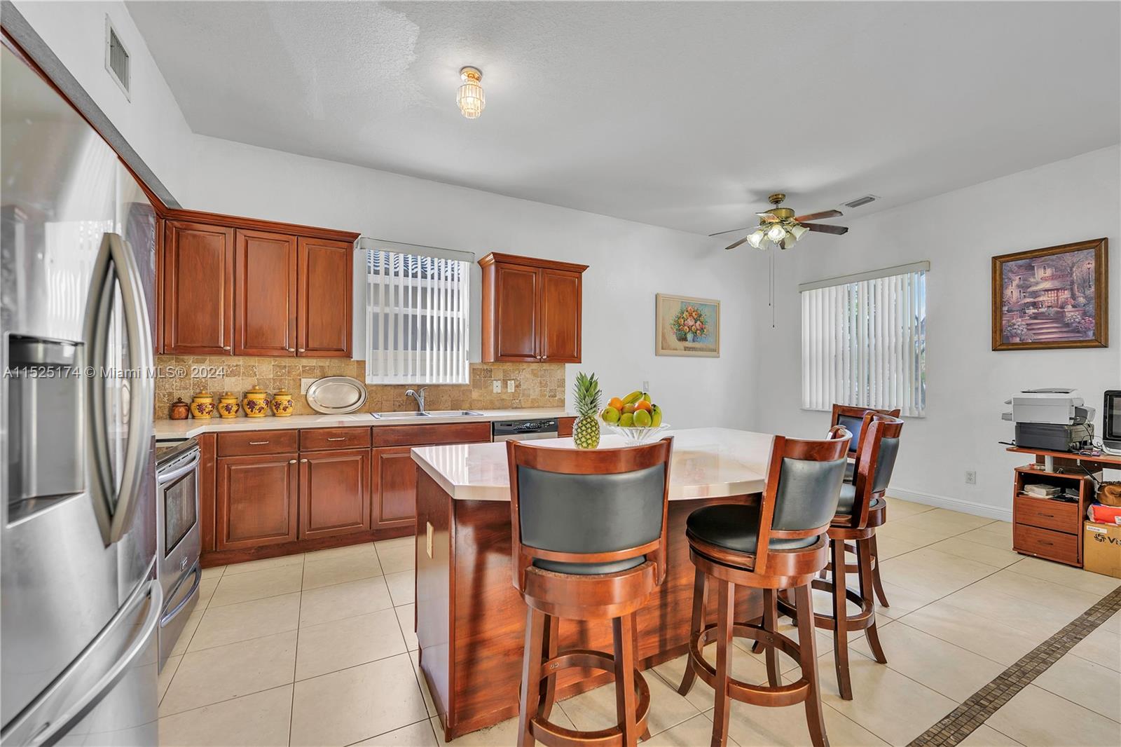 14093 Southwest 53rd Street Miramar, FL 33027 - Photo 19 of 45 a dining room with furniture and window