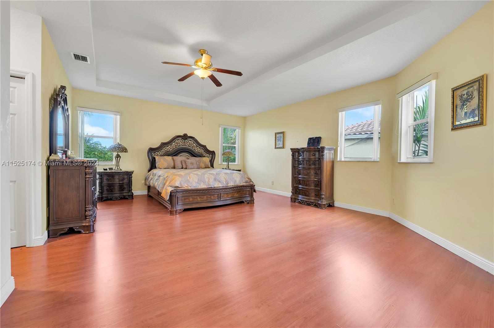 14093 Southwest 53rd Street Miramar, FL 33027 - Photo 29 of 45 a living room with furniture and a wooden floor
