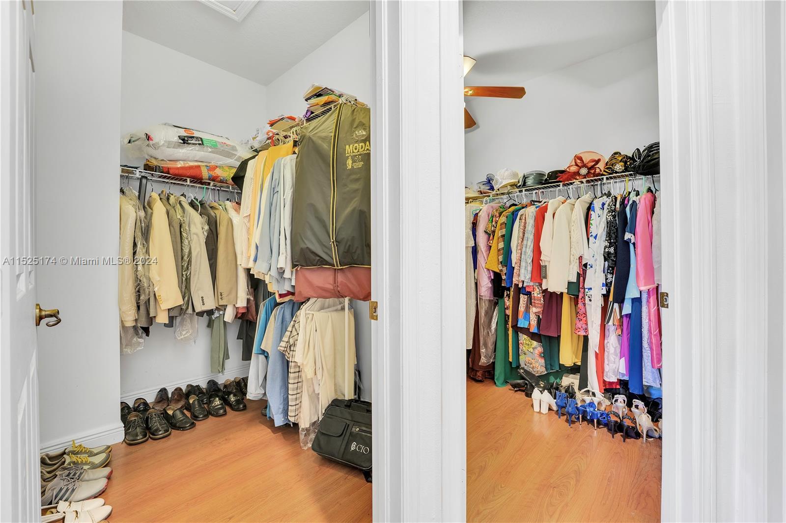 14093 Southwest 53rd Street Miramar, FL 33027 - Photo 31 of 45 a view of walk in closet with clothes and shoes