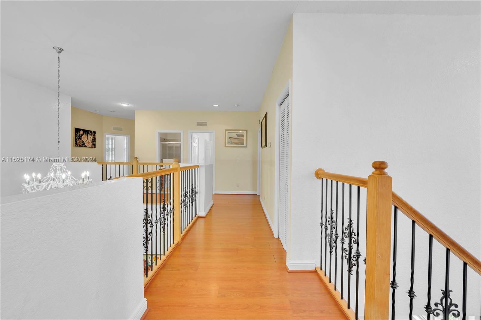 14093 Southwest 53rd Street Miramar, FL 33027 - Photo 33 of 45 a view of a hallway with wooden floor and windows