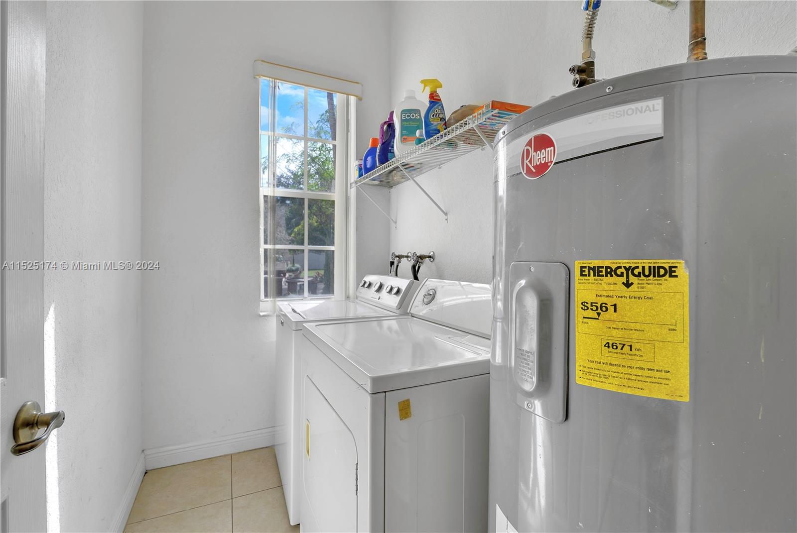 14093 Southwest 53rd Street Miramar, FL 33027 - Photo 42 of 45 a utility room with a sink washer and dryer
