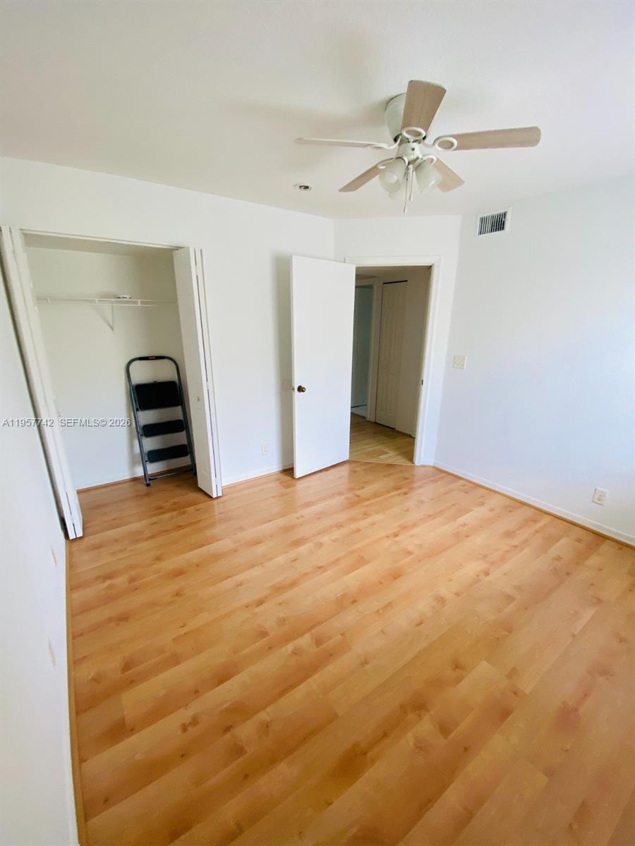 2433 Pasadena Way Weston, FL 33327 - Photo 12 of 20 a view of a livingroom with a ceiling fan