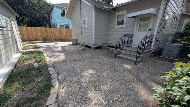 a view of a backyard with wooden floor and roof