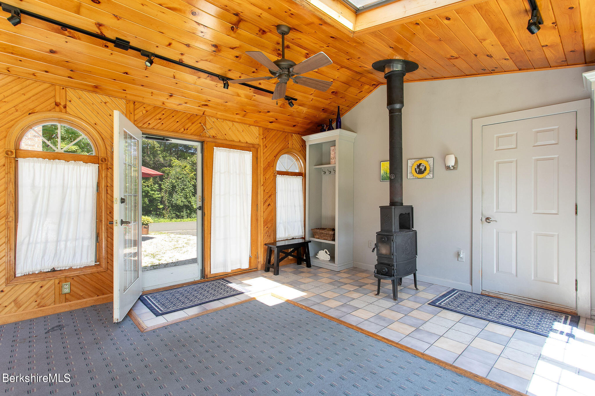 143 West Mountain Road Lenox, MA 01240 - Photo 10 of 26 Sunroom w/ Wood Stove, Door to Garage