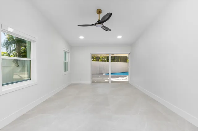 a bathroom with a shower toilet and sink