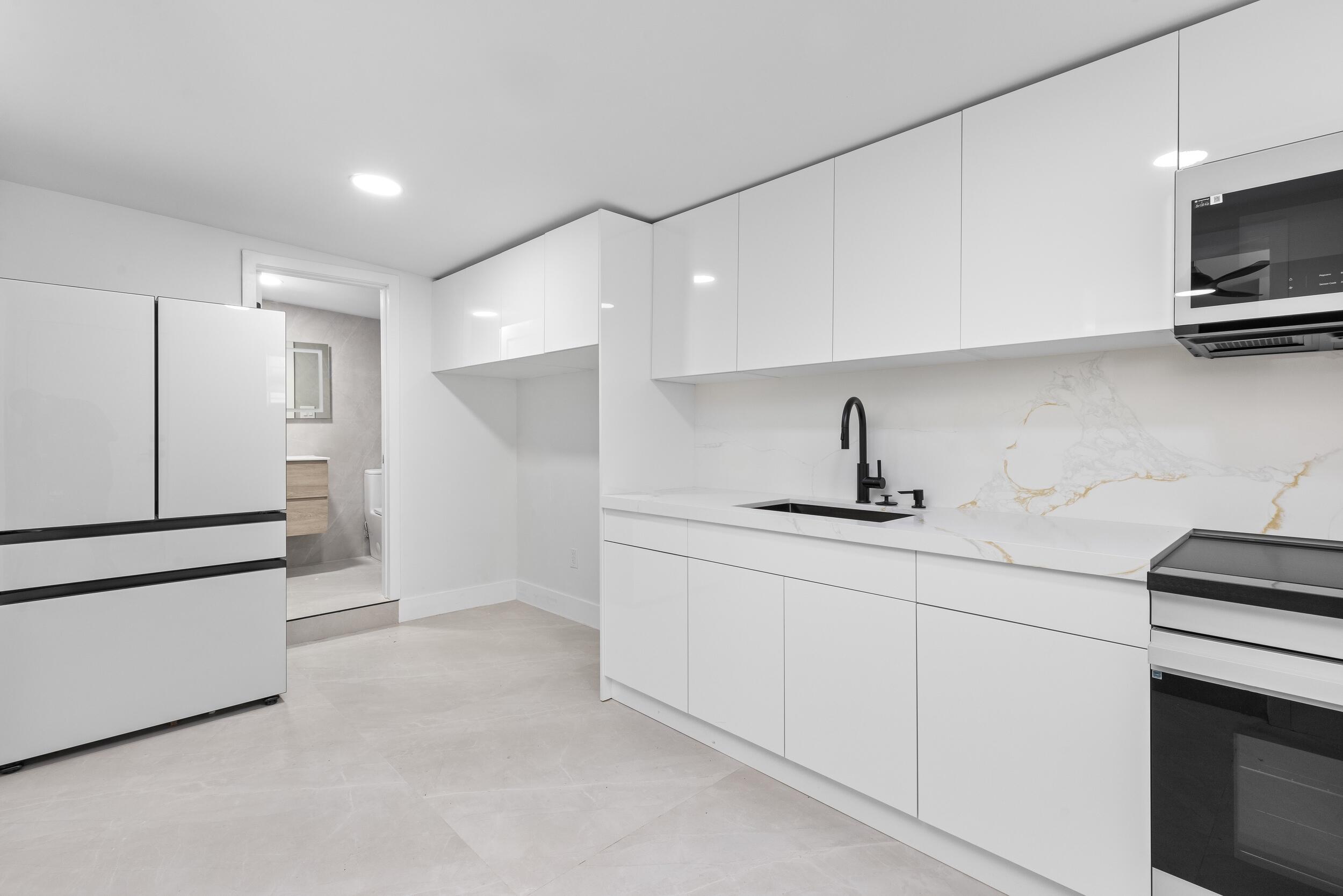 7134 San Sebastian Drive Boca Raton, FL 33433 - Photo 39 of 46 Kitchen Guest 1