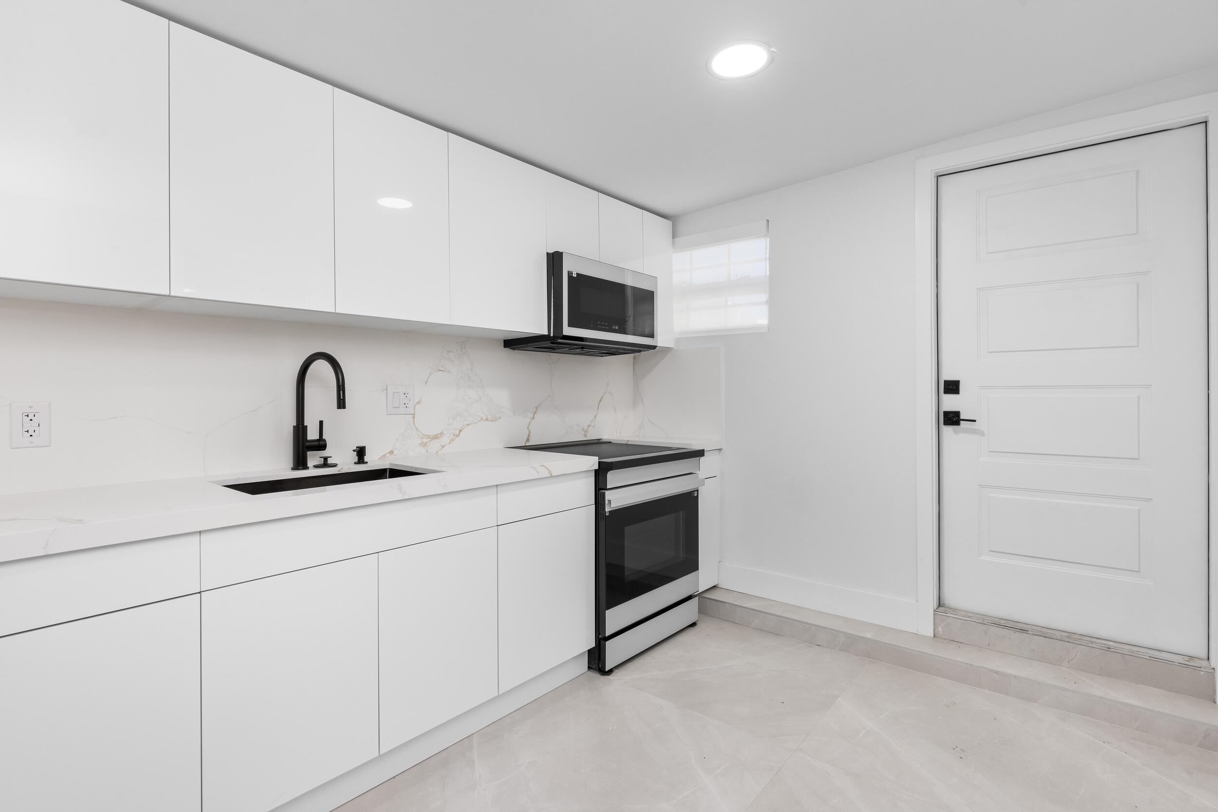 7134 San Sebastian Drive Boca Raton, FL 33433 - Photo 40 of 46 Kitchen Guest 2