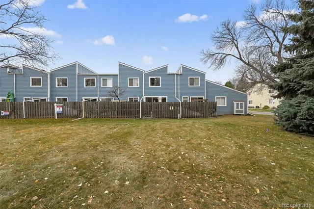 a house view with a backyard space