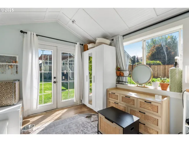 a bathroom with a sink vanity granite and a mirror