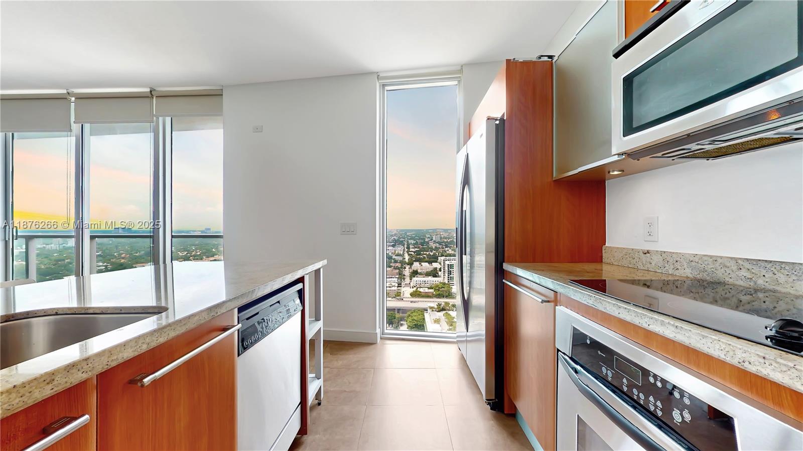 185 Southwest 7th Street, Unit 2900 Miami, FL 33130 - Photo 8 of 25 a view of a kitchen with a large window