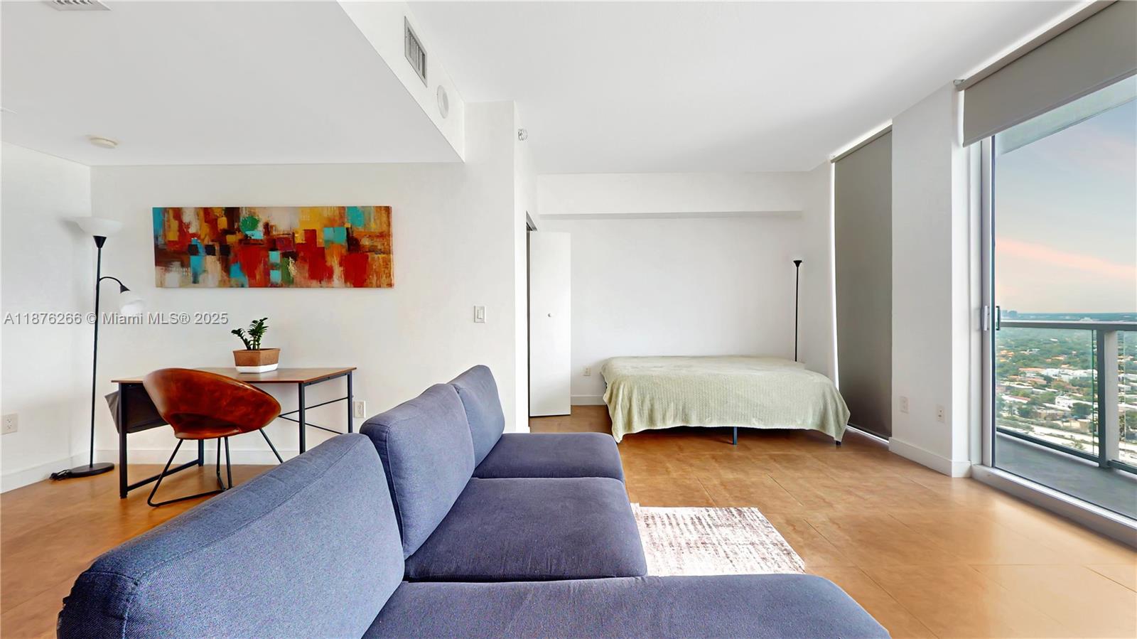 185 Southwest 7th Street, Unit 2900 Miami, FL 33130 - Photo 9 of 25 a living room with furniture and a rug