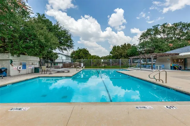 swimming pool view with sitting space and seating space