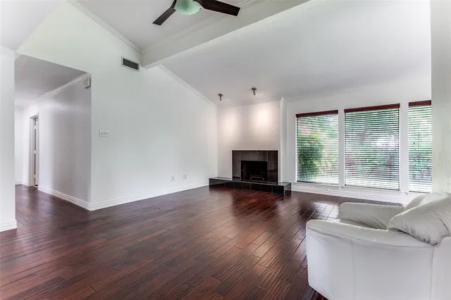 a view of livingroom with furniture wooden floor and window