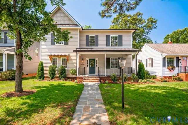 front view of a house with a yard