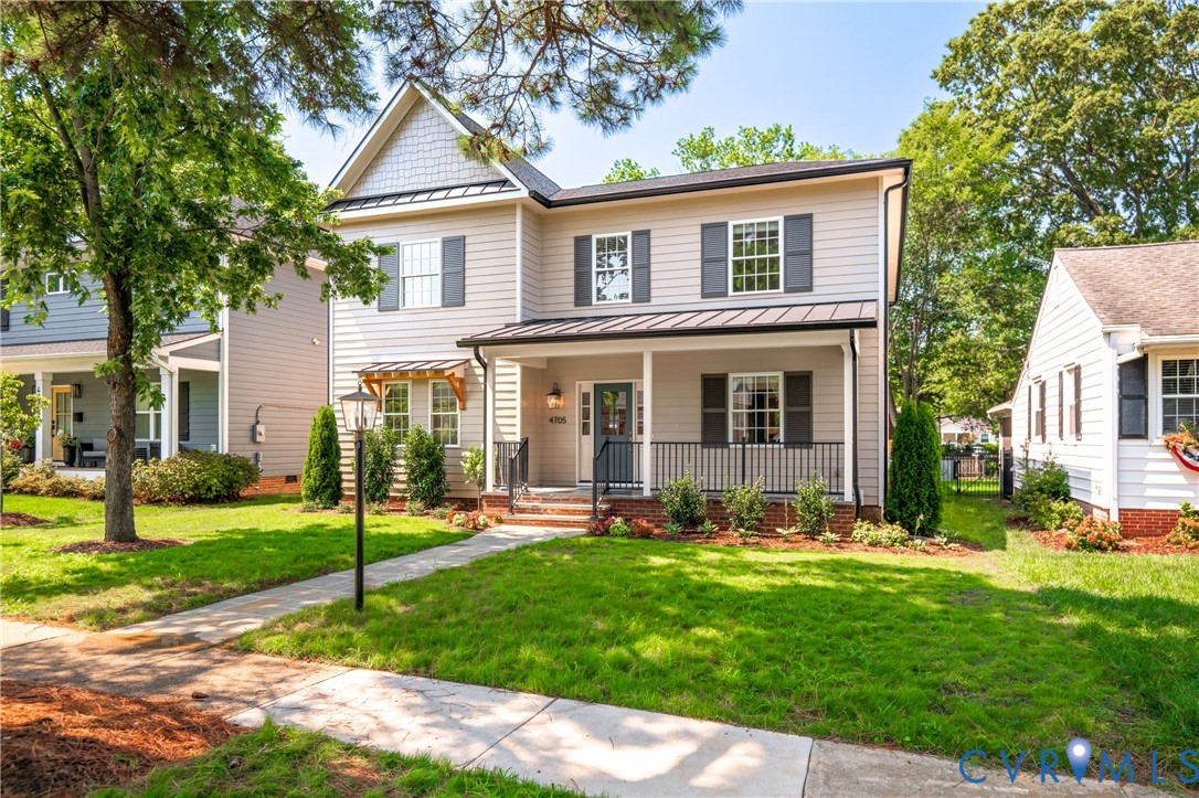 4705 Fitzhugh Avenue Richmond, VA 23230 - Photo 2 of 50 front view of a house with a yard