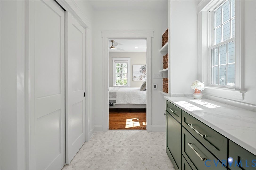 4705 Fitzhugh Avenue Richmond, VA 23230 - Photo 26 of 50 a bathroom with a sink and a mirror