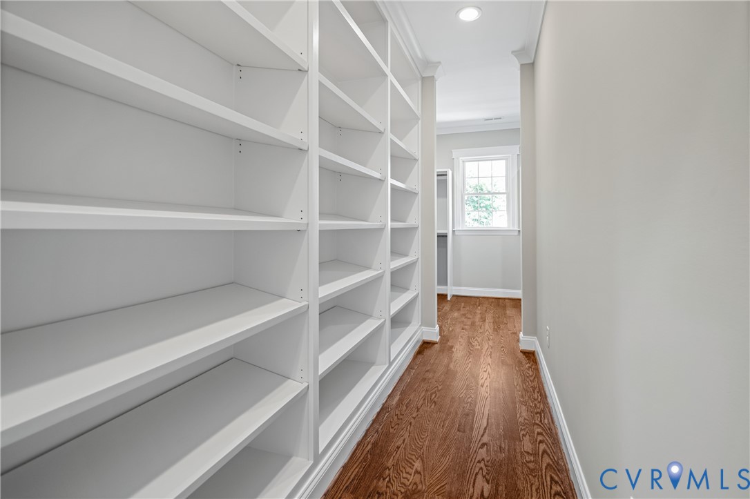 4705 Fitzhugh Avenue Richmond, VA 23230 - Photo 42 of 50 a view of walk in closet with empty racks
