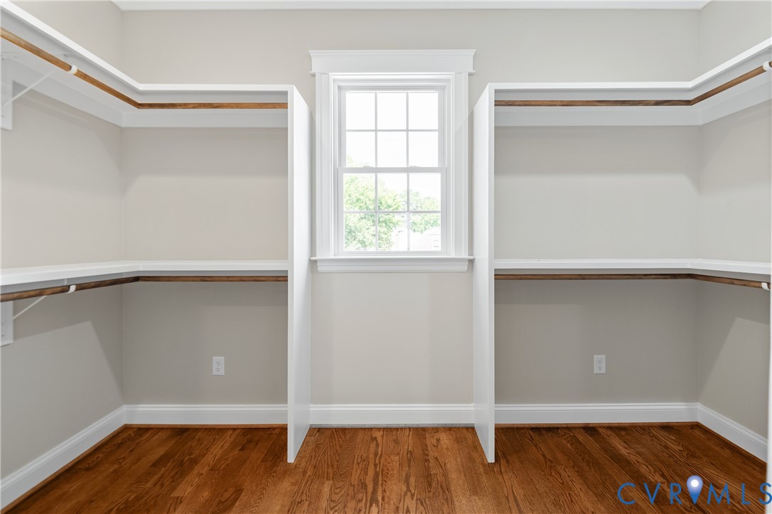 4705 Fitzhugh Avenue Richmond, VA 23230 - Photo 43 of 50 a view of an empty room with wooden floor and a window