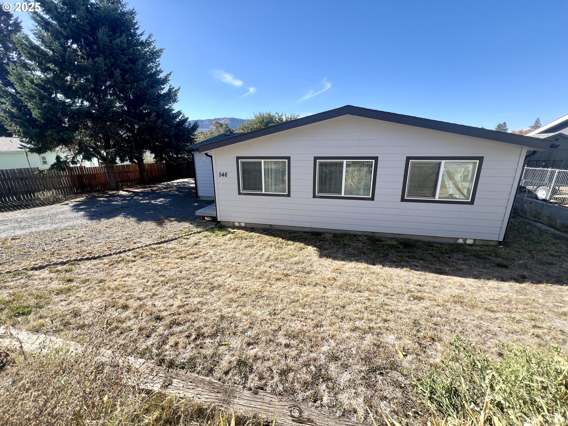a house view with a outdoor space