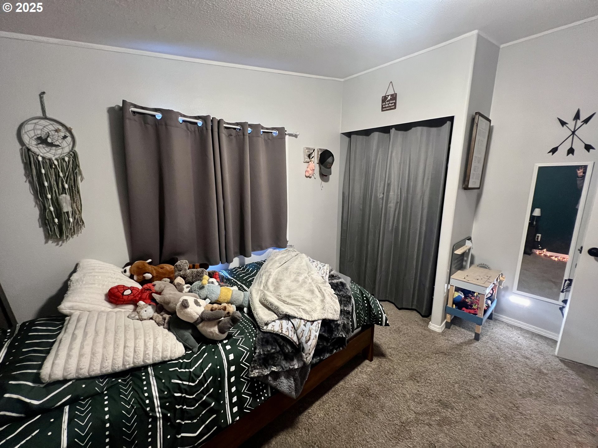 548 Pioneer Court Union, OR 97883 - Photo 12 of 18 a bedroom with a bed and a mirror