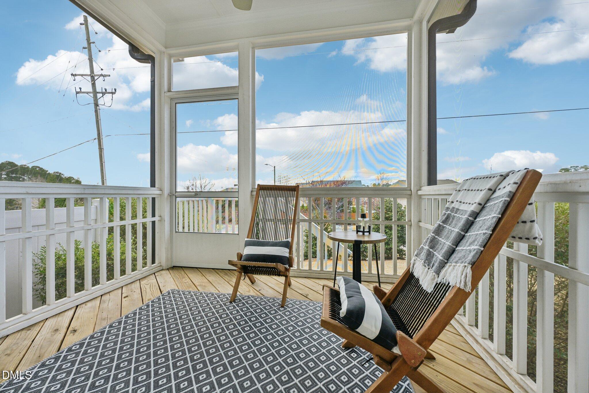 8405 Zinc Autumn Path Raleigh, NC 27615 - Photo 23 of 24 a view of a balcony with furniture