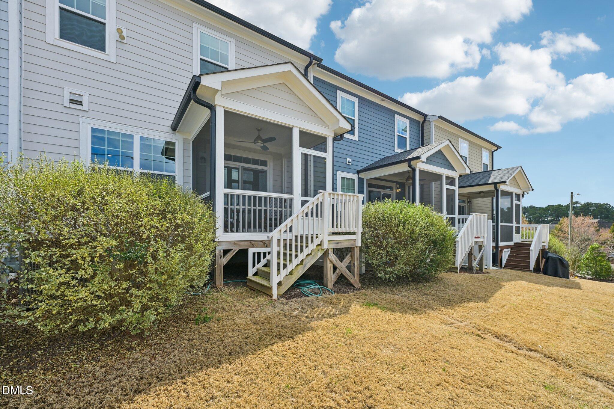 8405 Zinc Autumn Path Raleigh, NC 27615 - Photo 24 of 24 a view of a house with backyard and sitting area