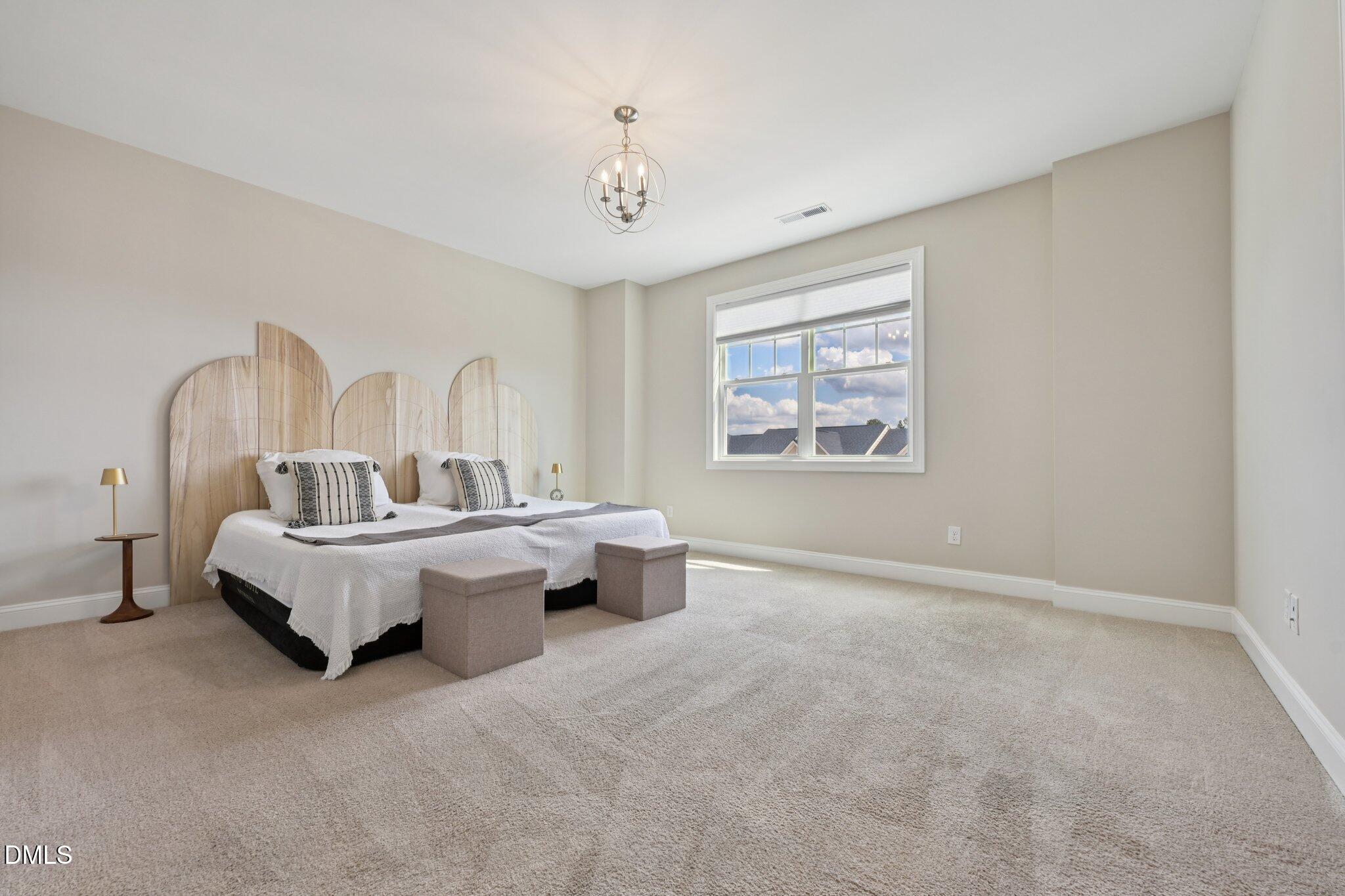 8405 Zinc Autumn Path Raleigh, NC 27615 - Photo 10 of 24 a living room with furniture and a window