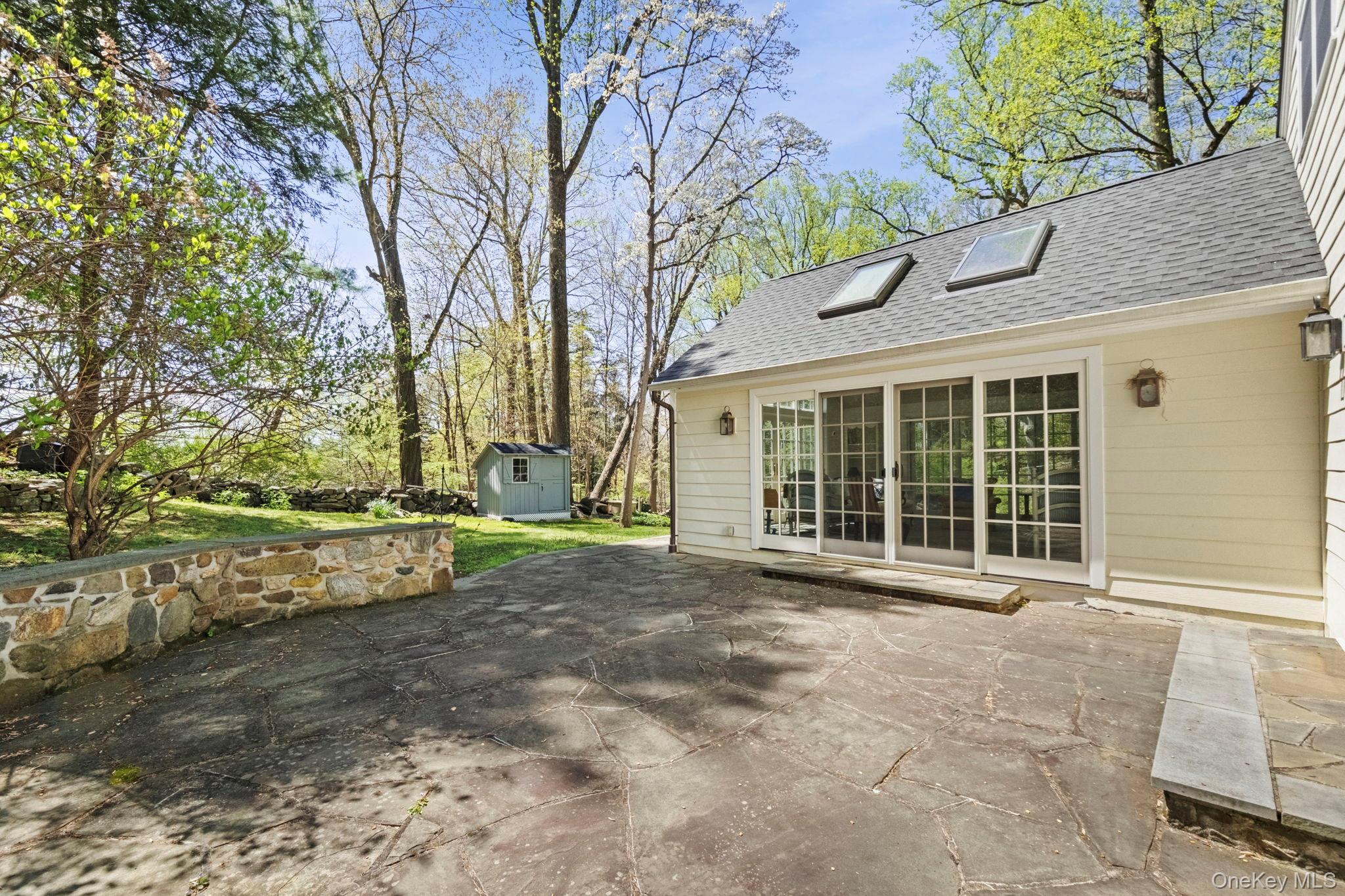 12 Harris Road Katonah, NY 10536 - Photo 14 of 38 a view of a house with a yard