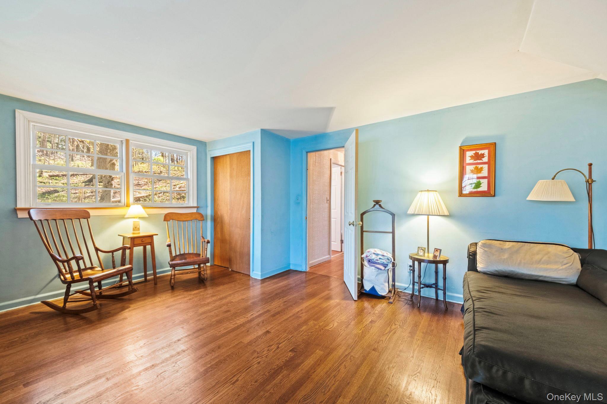 12 Harris Road Katonah, NY 10536 - Photo 26 of 38 a view of a livingroom with furniture and a couch