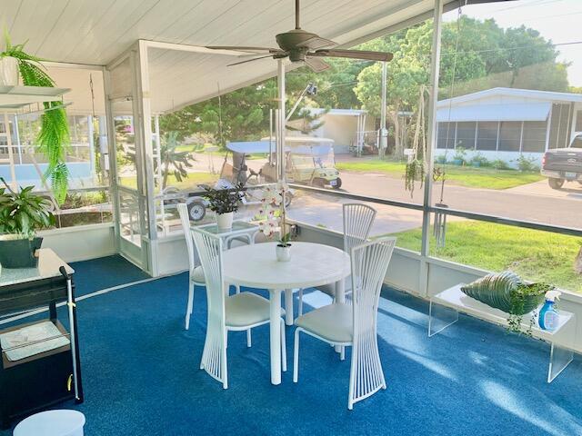 611 North Emerald Drive Key Largo, FL 33037 - Photo 6 of 36 a dining room with furniture water view and wooden floor