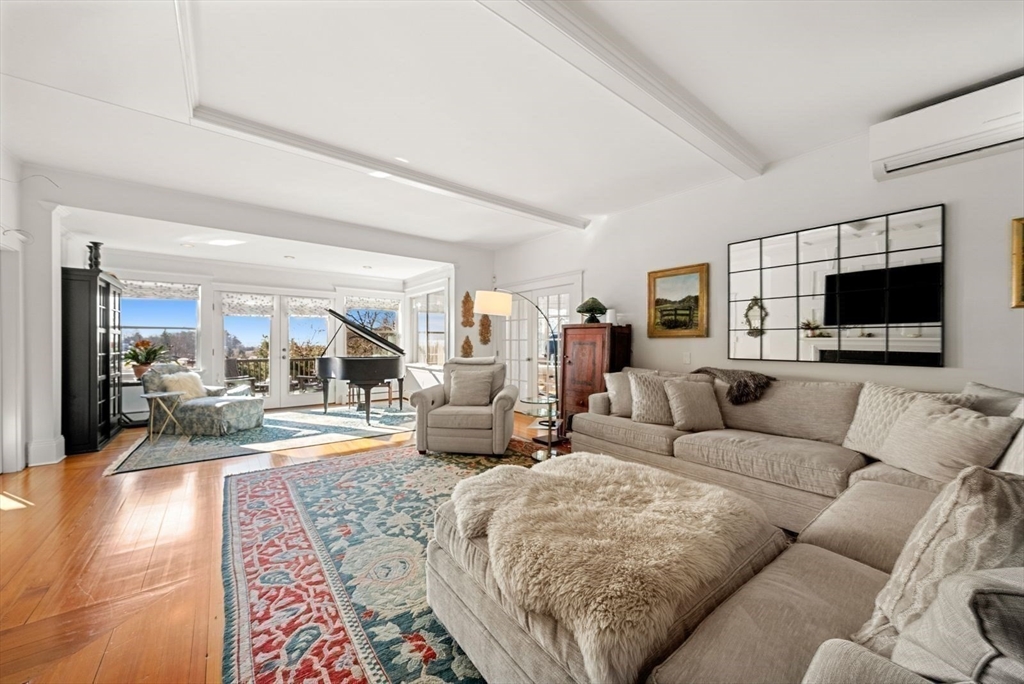 468 Summer Street Manchester, MA 01944 - Photo 18 of 36 a living room with furniture and a flat screen tv