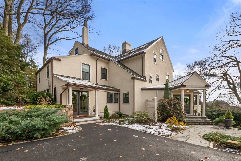 468 Summer Street Manchester, MA 01944 - Photo 2 of 36 a front view of a house with a tree