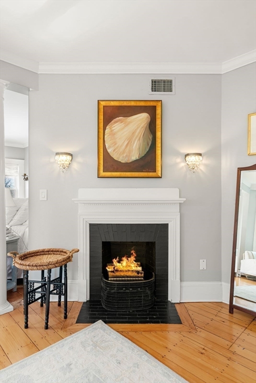 468 Summer Street Manchester, MA 01944 - Photo 25 of 36 a living room with furniture and a fireplace