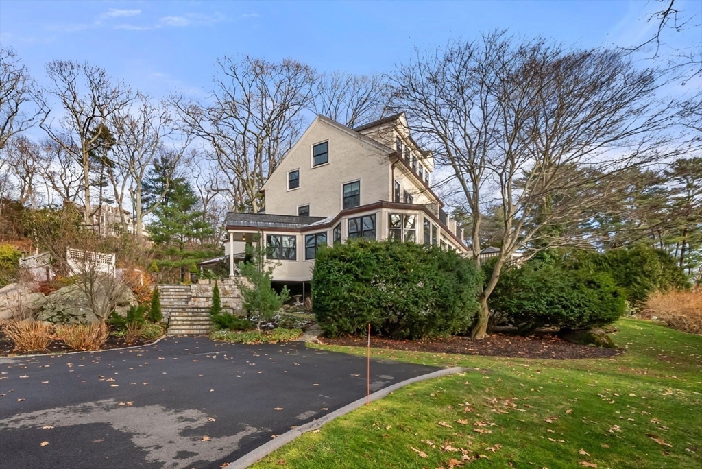 468 Summer Street Manchester, MA 01944 - Photo 5 of 36 a front view of a house with a yard