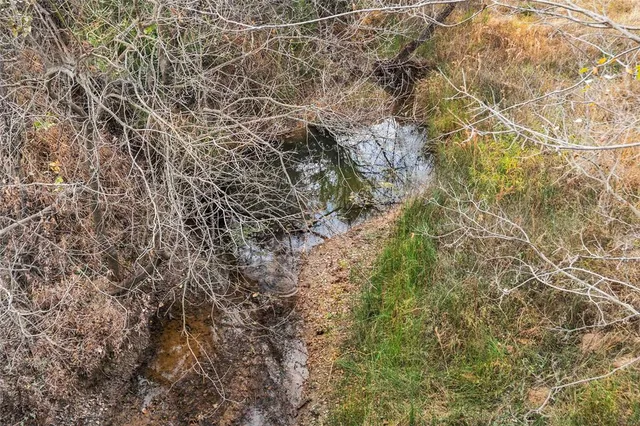 a view of a lake with mountains in the background