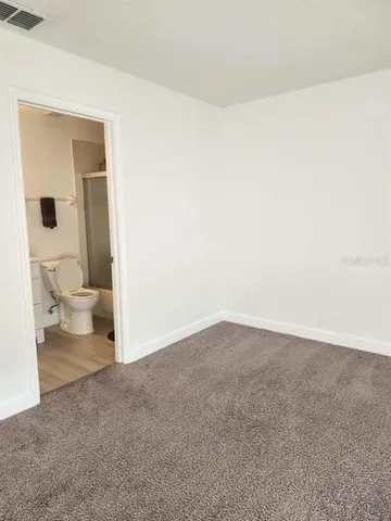 a bathroom with a toilet