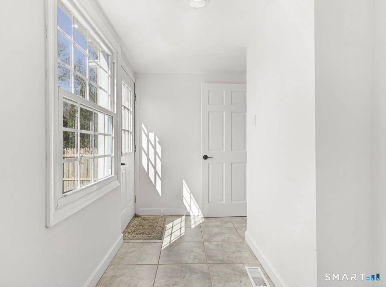 709 Tunxis Hill Road Fairfield, CT 06825 - Photo 12 of 37 mud room or office with half bath