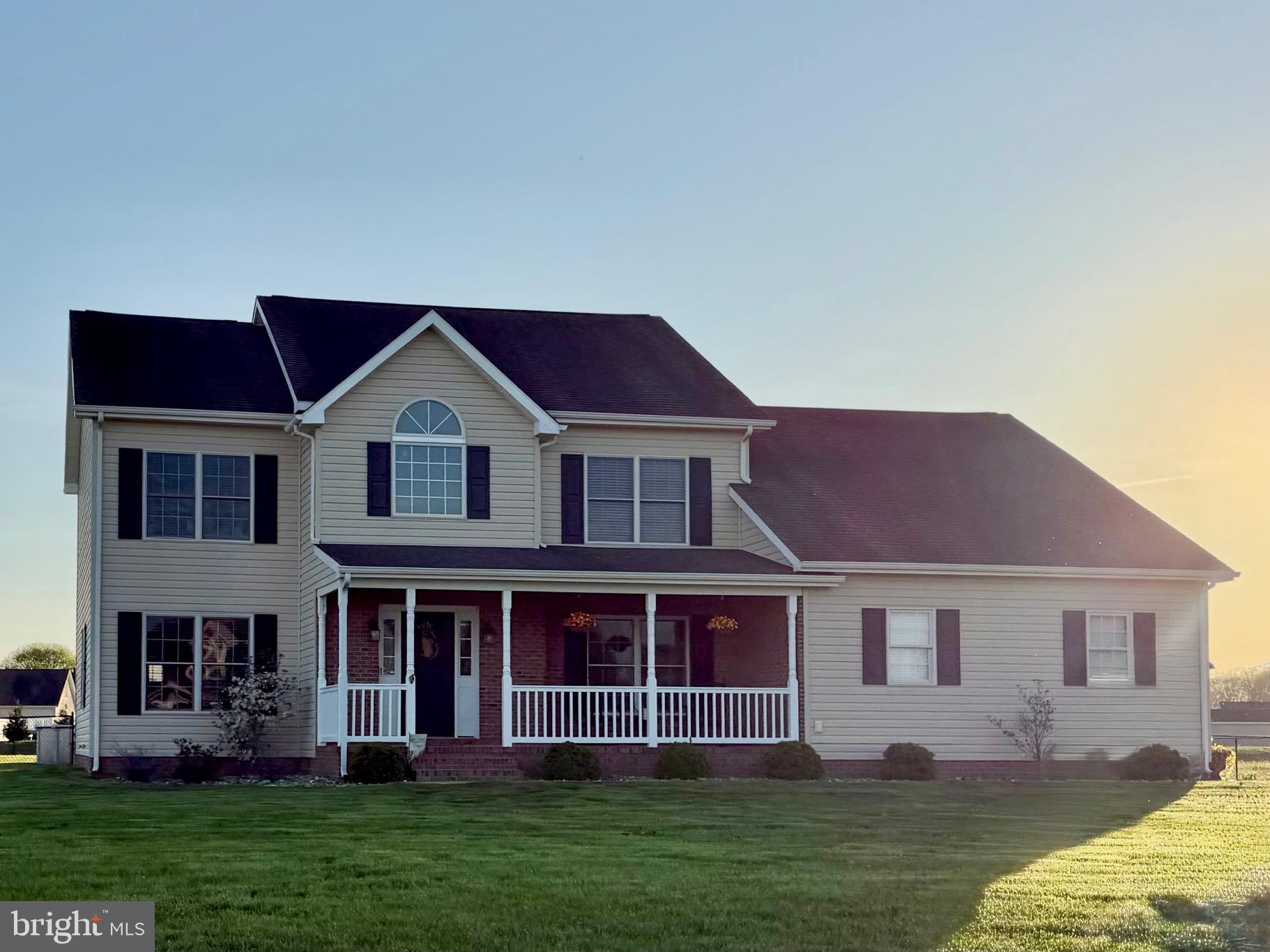 36835 Red Berry Road Delmar, DE 19940 - Photo 1 of 1 a front view of a house with garden