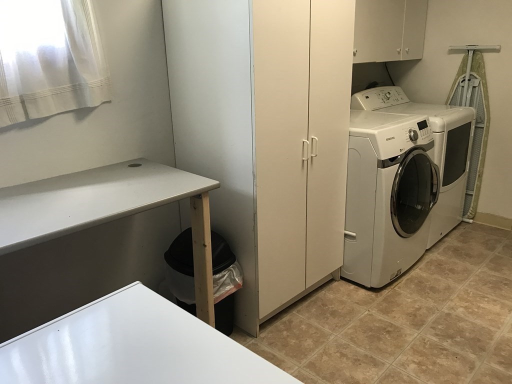 6 Braemore Road Natick, MA 01760 - Photo 15 of 27 a utility room with dryer and washer