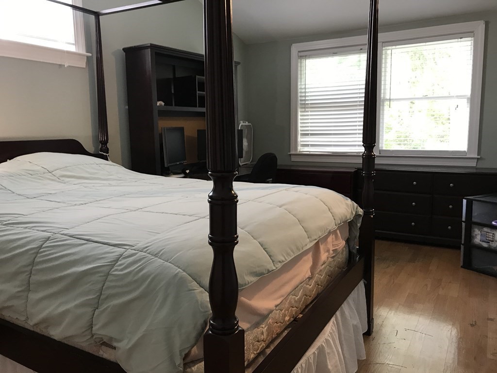 6 Braemore Road Natick, MA 01760 - Photo 17 of 27 a bedroom with a bed and a window
