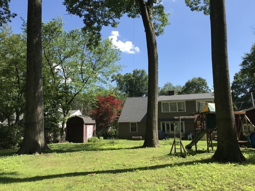 6 Braemore Road Natick, MA 01760 - Photo 26 of 27 a view of house with backyard