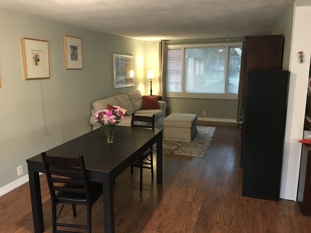 6 Braemore Road Natick, MA 01760 - Photo 7 of 27 a view of a dining room with furniture and wooden floor