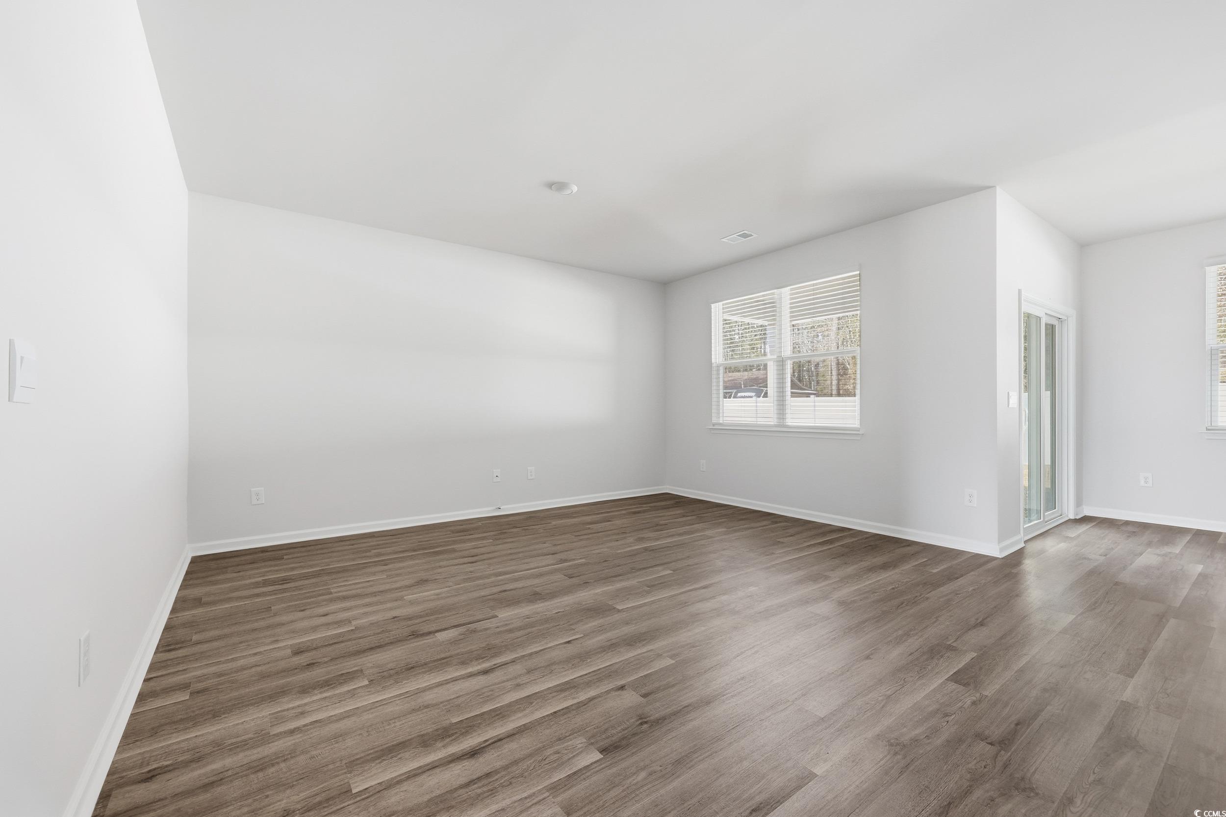 270 Columbus Street Conway, SC 29526 - Photo 14 of 38 Unfurnished room featuring wood finished floors and baseboards