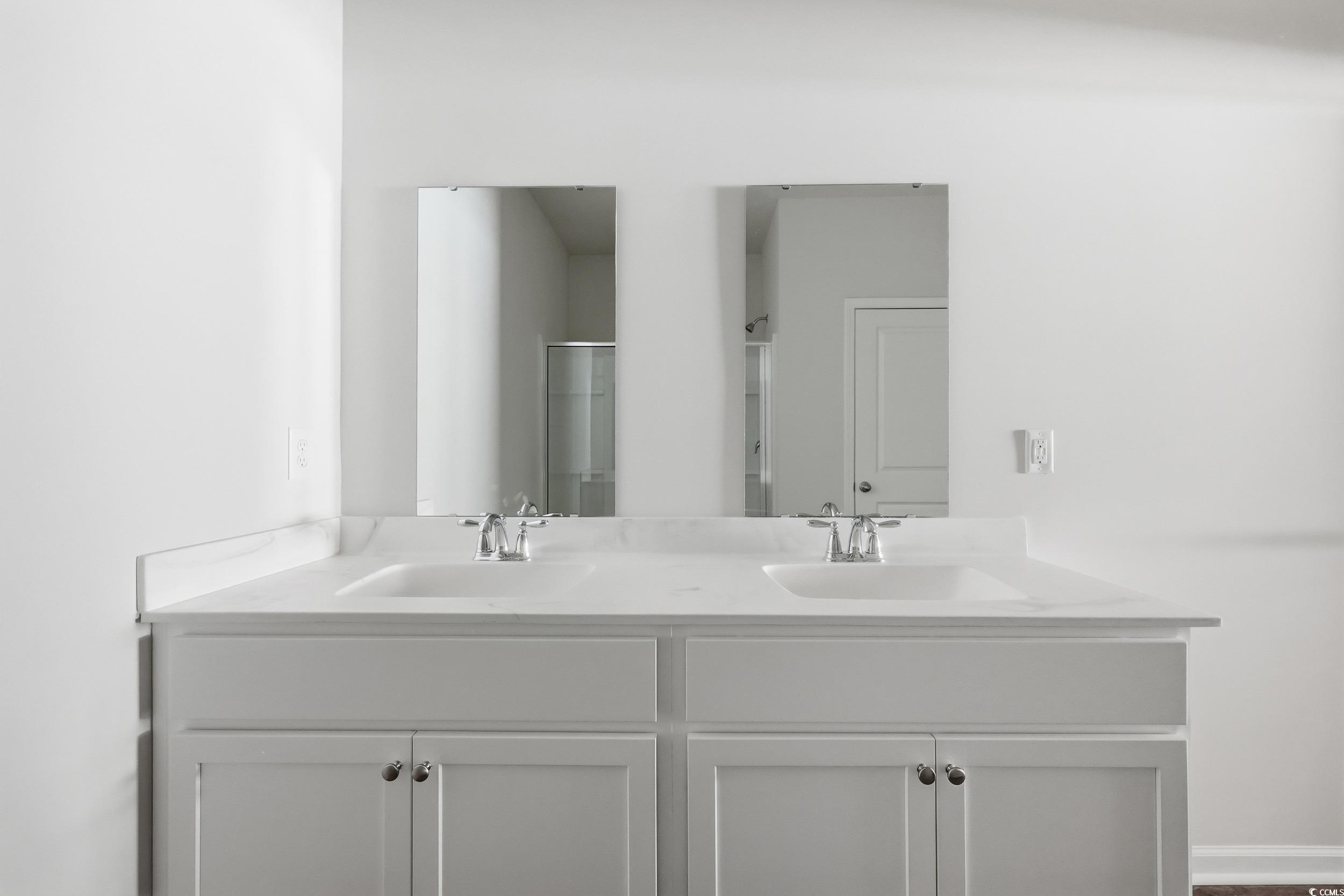 270 Columbus Street Conway, SC 29526 - Photo 23 of 38 Full bathroom with double vanity and a shower stall