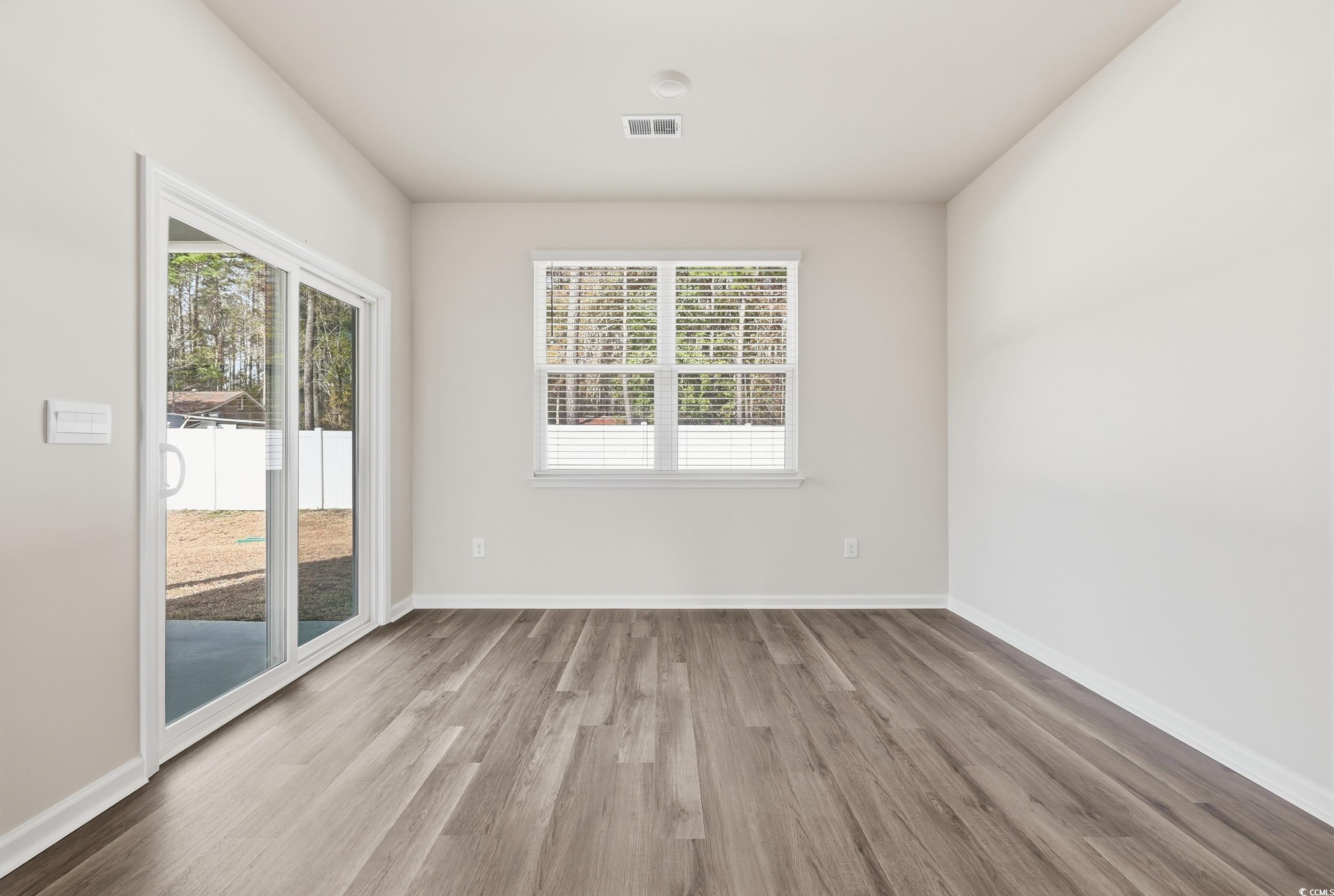 270 Columbus Street Conway, SC 29526 - Photo 3 of 38 Unfurnished room featuring light wood finished floors and baseboards