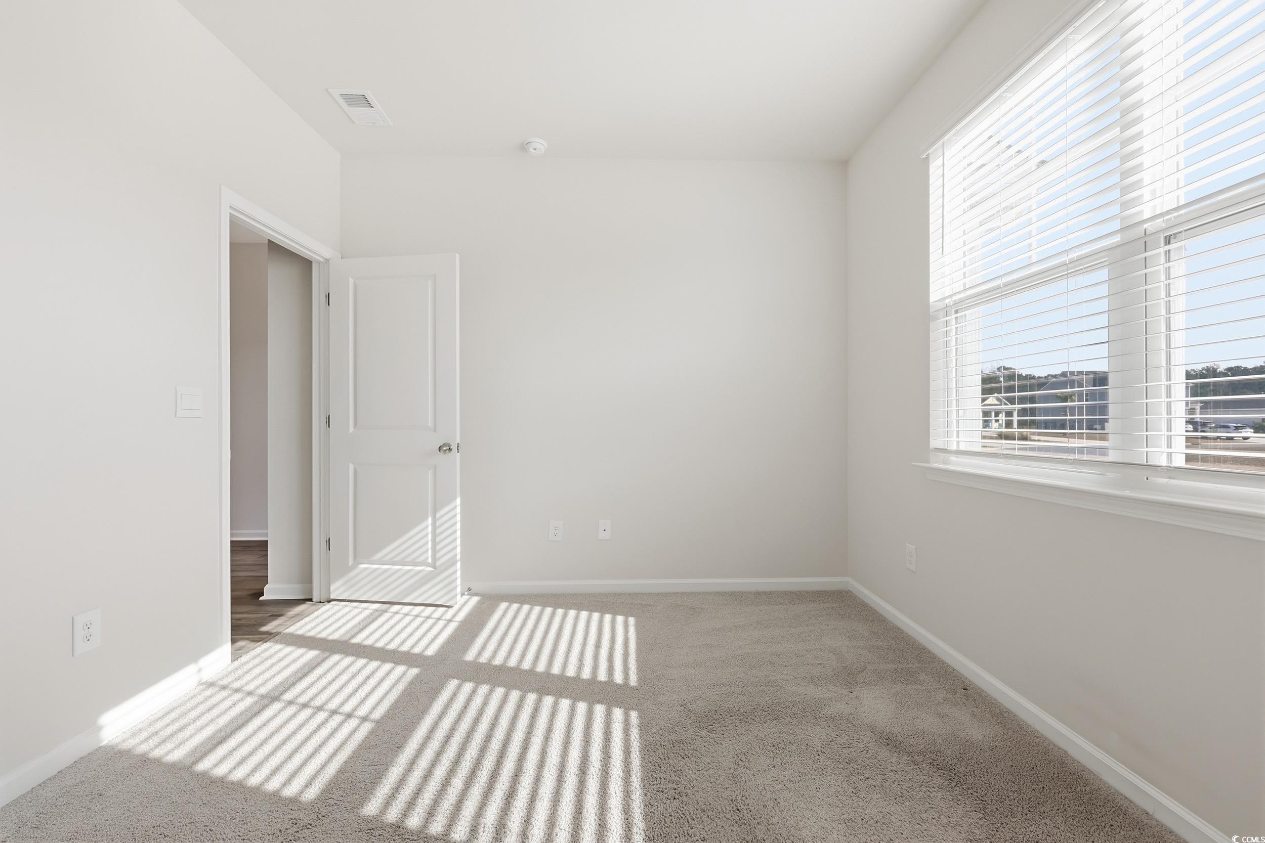270 Columbus Street Conway, SC 29526 - Photo 4 of 38 Empty room featuring light carpet