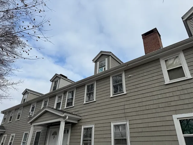 a front view of a house with windows
