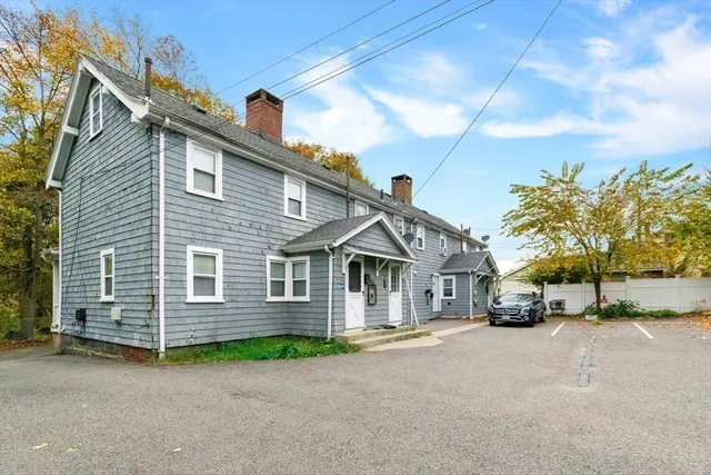 a car parked in front of a house